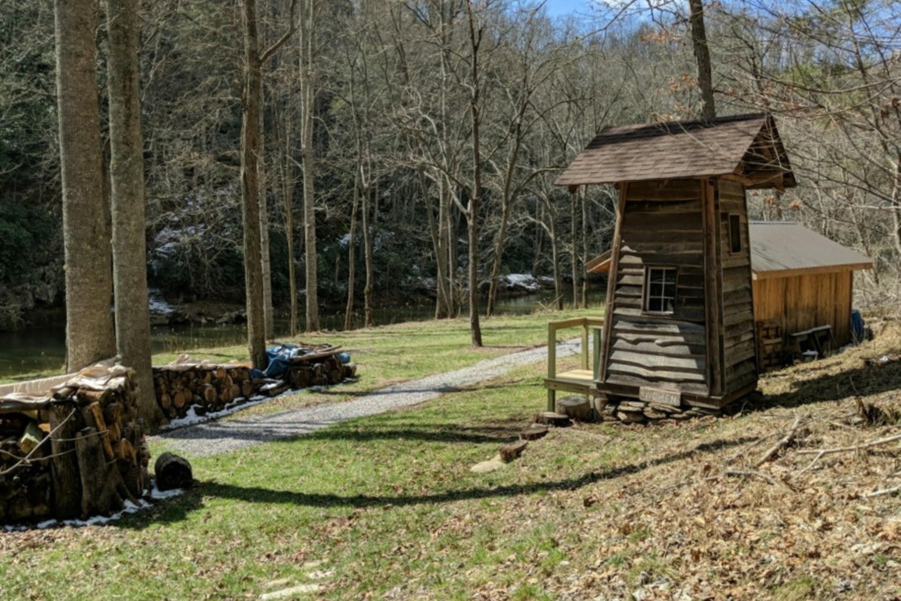 5600 Chestnut Ridge Road Riner, VA 24149 - Photo 8 of 23 a front view of a house with garden