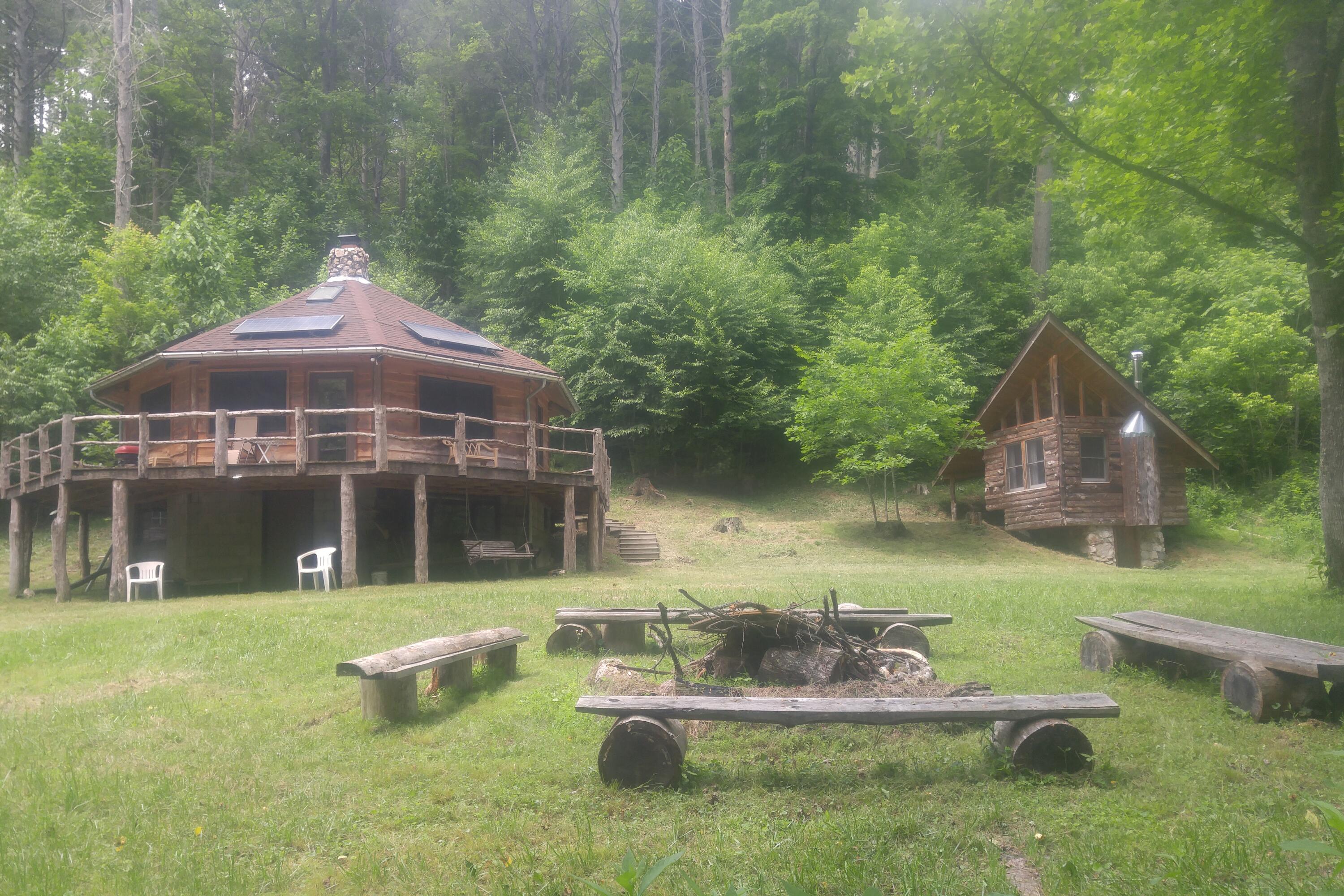 5600 Chestnut Ridge Road Riner, VA 24149 - Photo 10 of 23 a front view of a house with a yard table and chairs