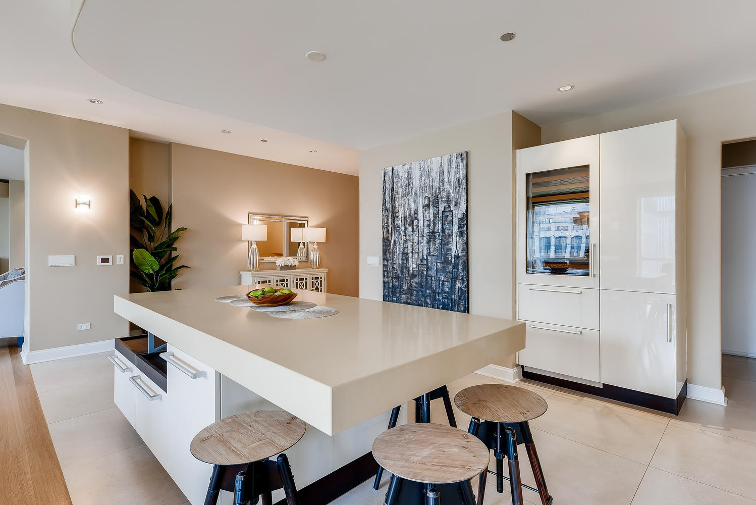 270 East Pearson Street, Unit 1402 Chicago, IL 60611 - Photo 11 of 34 a view of a dining room with furniture and wooden floor