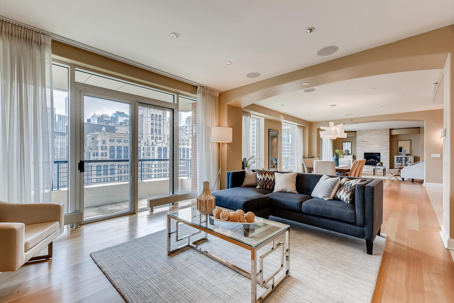 270 East Pearson Street, Unit 1402 Chicago, IL 60611 - Photo 14 of 34 a living room with furniture and a large window