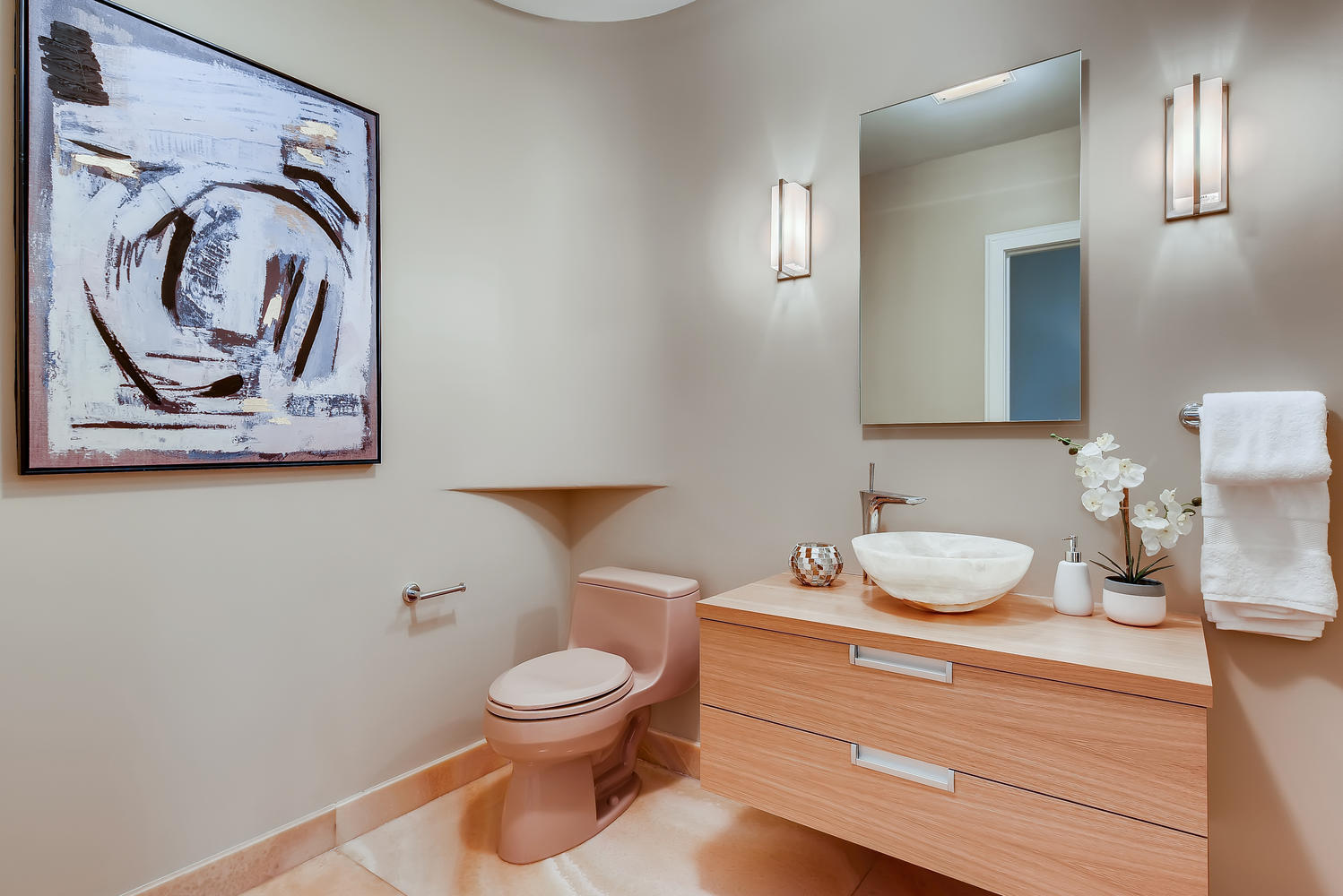 270 East Pearson Street, Unit 1402 Chicago, IL 60611 - Photo 16 of 34 a bathroom with a toilet sink vanity and mirror