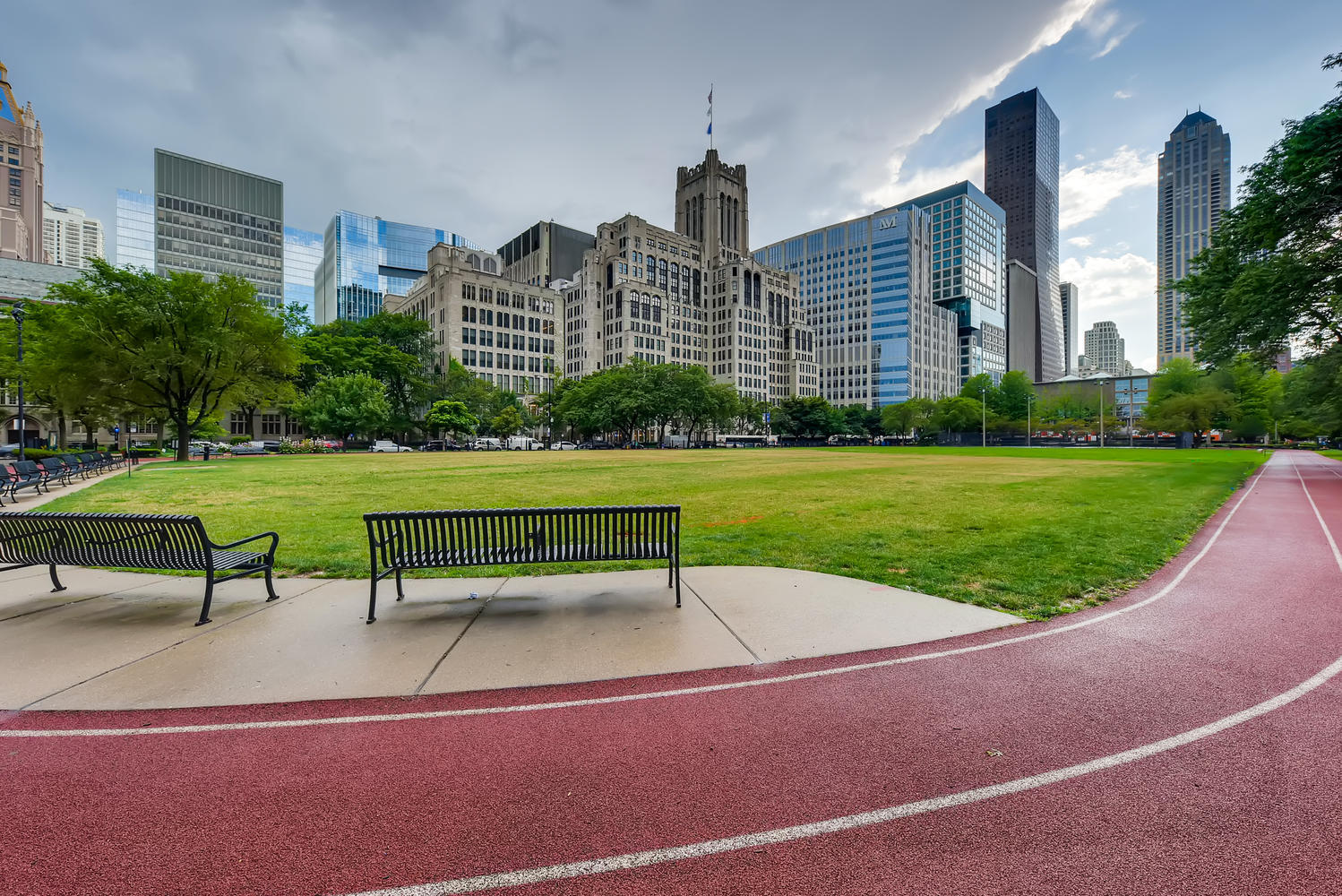 270 East Pearson Street, Unit 1402 Chicago, IL 60611 - Photo 32 of 34 a park bench sitting in the middle of a park