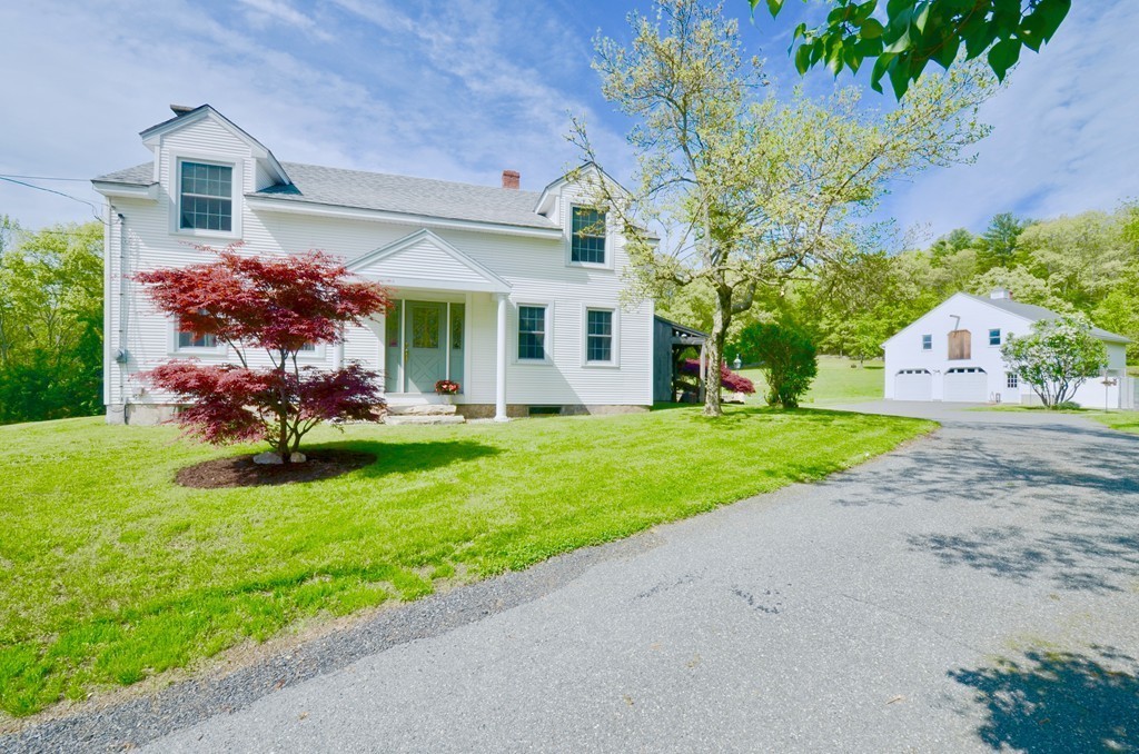 41 Rawson Road Webster, MA 01570 - Photo 1 of 30 a front view of house with yard and green space