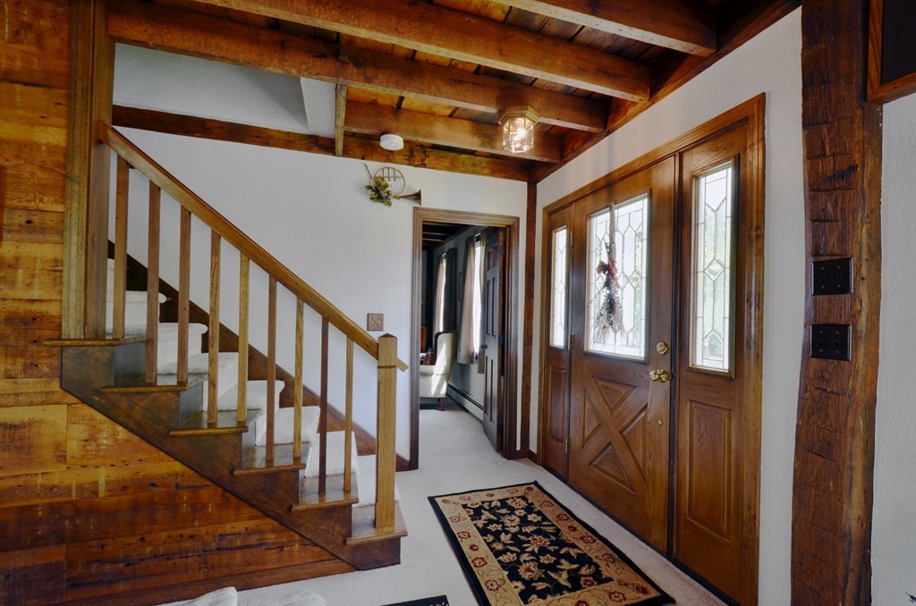41 Rawson Road Webster, MA 01570 - Photo 15 of 30 a view of staircase with wooden floor and staircase