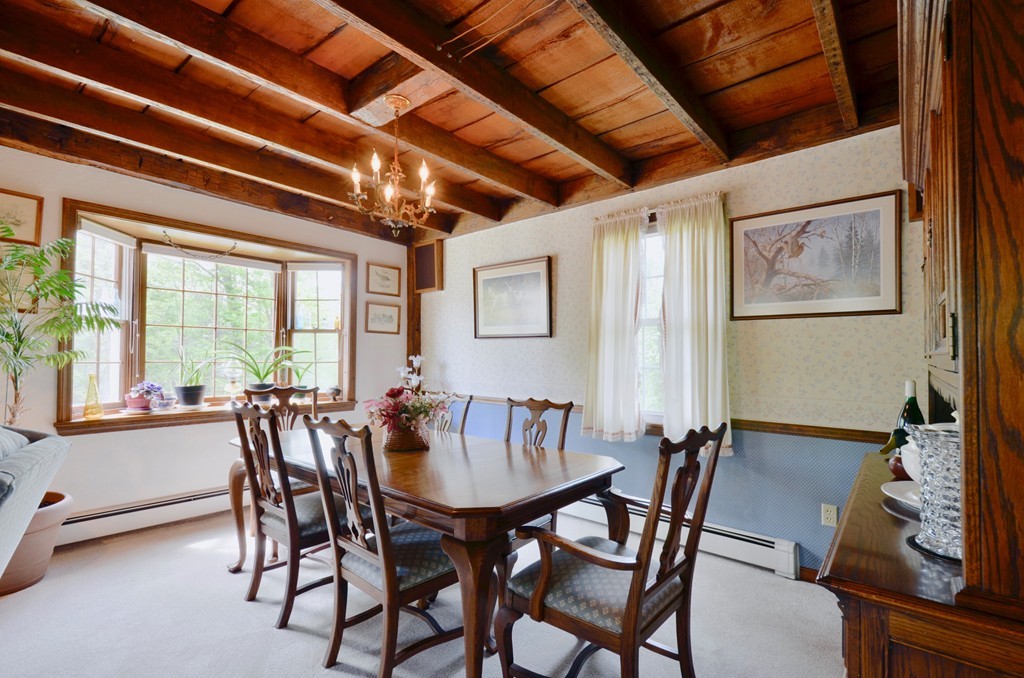 41 Rawson Road Webster, MA 01570 - Photo 16 of 30 a view of a dining room with furniture window and outside view