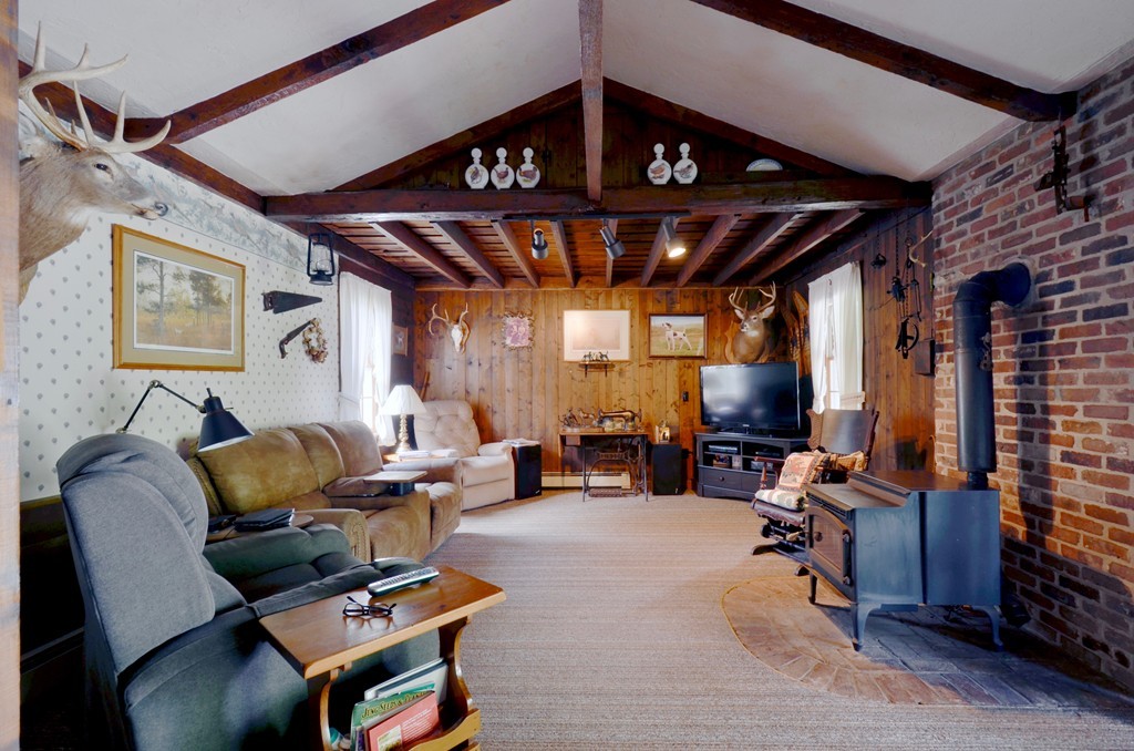 41 Rawson Road Webster, MA 01570 - Photo 17 of 30 a living room with furniture