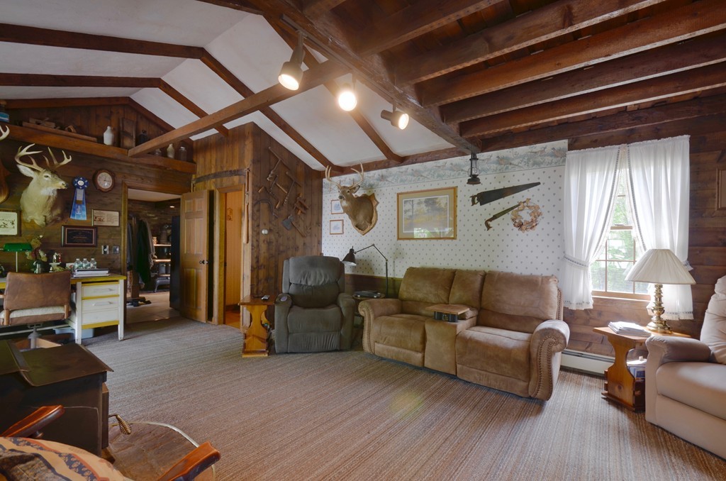 41 Rawson Road Webster, MA 01570 - Photo 18 of 30 a living room with furniture and a large window