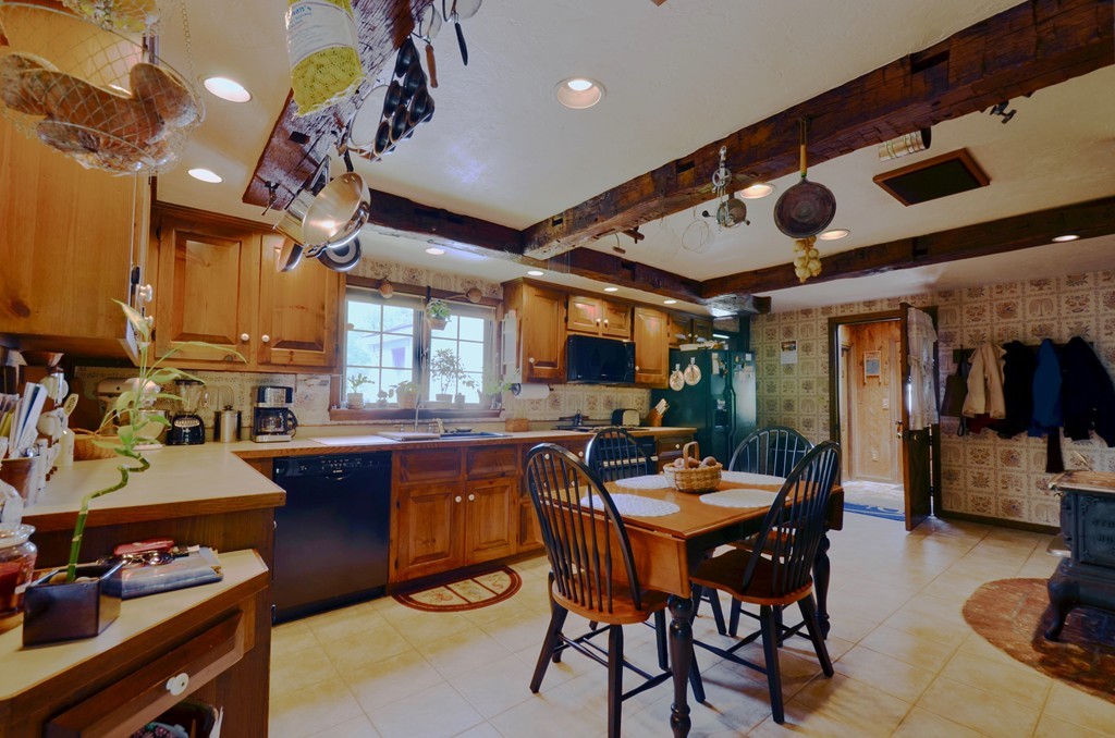 41 Rawson Road Webster, MA 01570 - Photo 20 of 30 a view of a dining room with furniture and chandelier