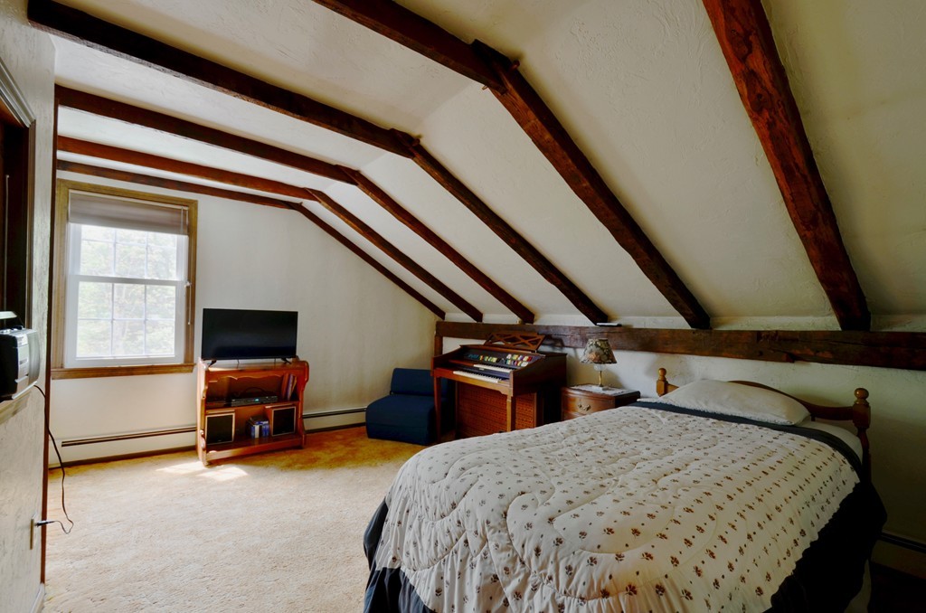 41 Rawson Road Webster, MA 01570 - Photo 28 of 30 a bed room with a bed and a tv