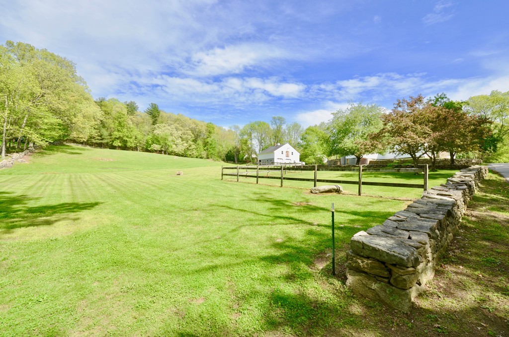 41 Rawson Road Webster, MA 01570 - Photo 9 of 30 a view of a golf course with a lake view
