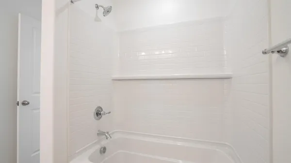 a bathroom with a bathtub