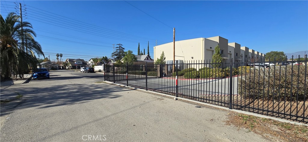 0 East Pennsylvania Avenue Colton, CA 92324 - Photo 2 of 4 a view of a street with houses on the road