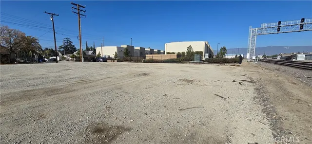 a view of a road with a yard