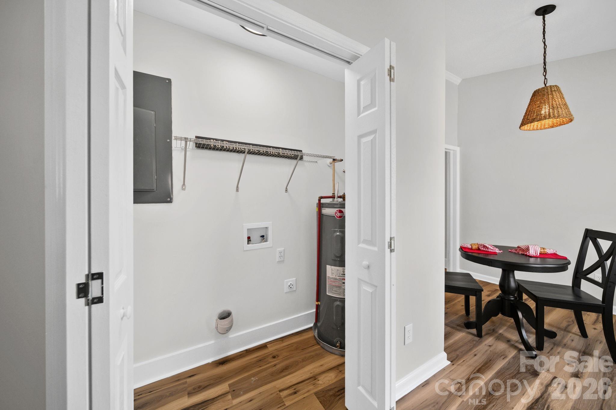 196 Spruce Street Badin, NC 28009 - Photo 18 of 43 a bathroom with a shower and a chair