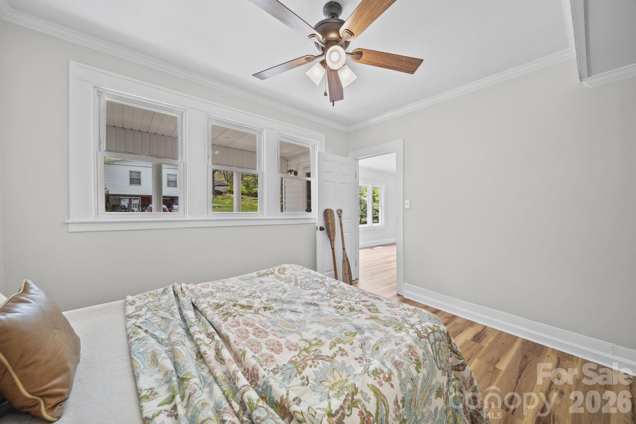 196 Spruce Street Badin, NC 28009 - Photo 22 of 43 a bedroom with a bed and a window