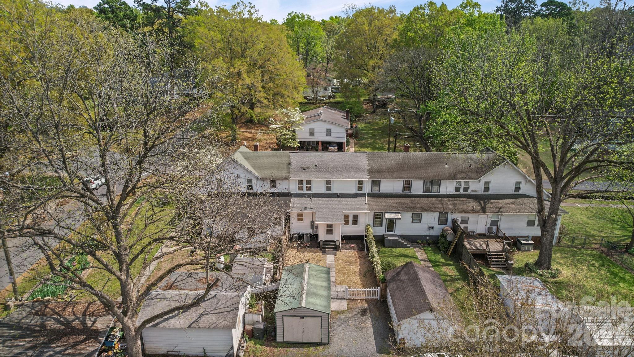 196 Spruce Street Badin, NC 28009 - Photo 34 of 43 a view of a swimming pool with a patio