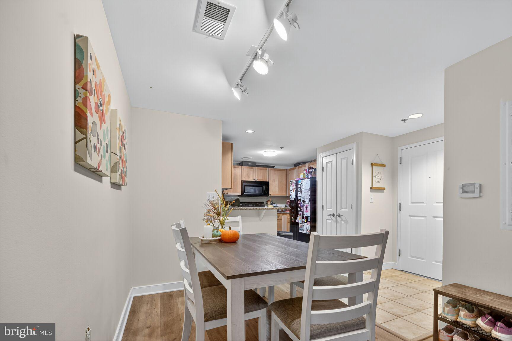 777 7th Street Northwest, Unit 526 Washington, DC 20001 - Photo 13 of 24 a kitchen with stainless steel appliances a refrigerator and microwave