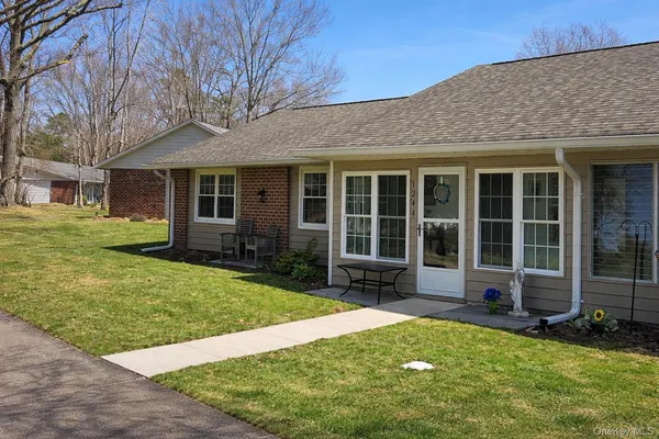 $354,900 | 124 Exmore Court, Unit A, Ridge, NY 11961