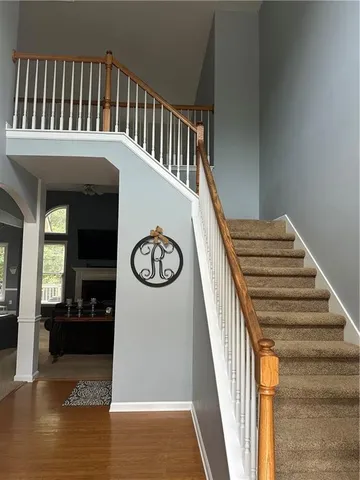 a view of entryway with wooden floor