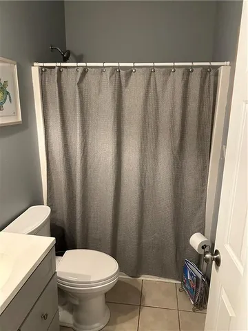 a bathroom with a sink and toilet