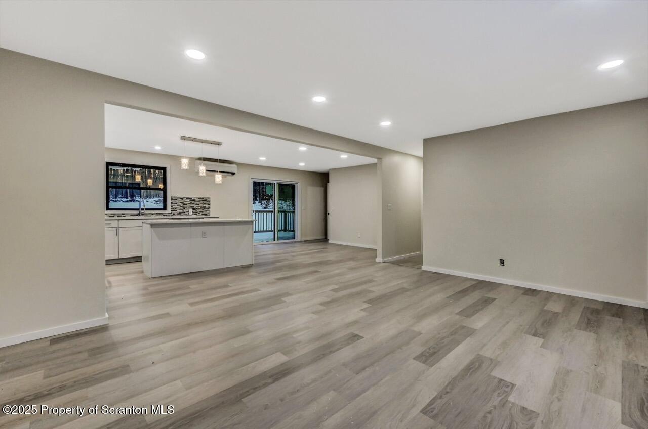 71 Sandy Beach Road Gouldsboro, PA 18424 - Photo 15 of 57 a view of a kitchen with a sink and a refrigerator
