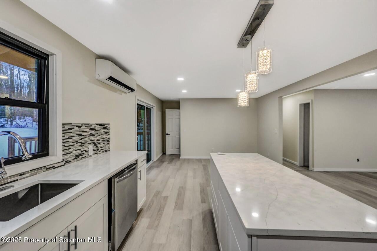 71 Sandy Beach Road Gouldsboro, PA 18424 - Photo 22 of 57 a view of a kitchen with a sink and dishwasher