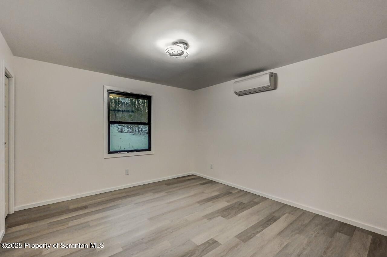 71 Sandy Beach Road Gouldsboro, PA 18424 - Photo 29 of 57 an empty room with a window