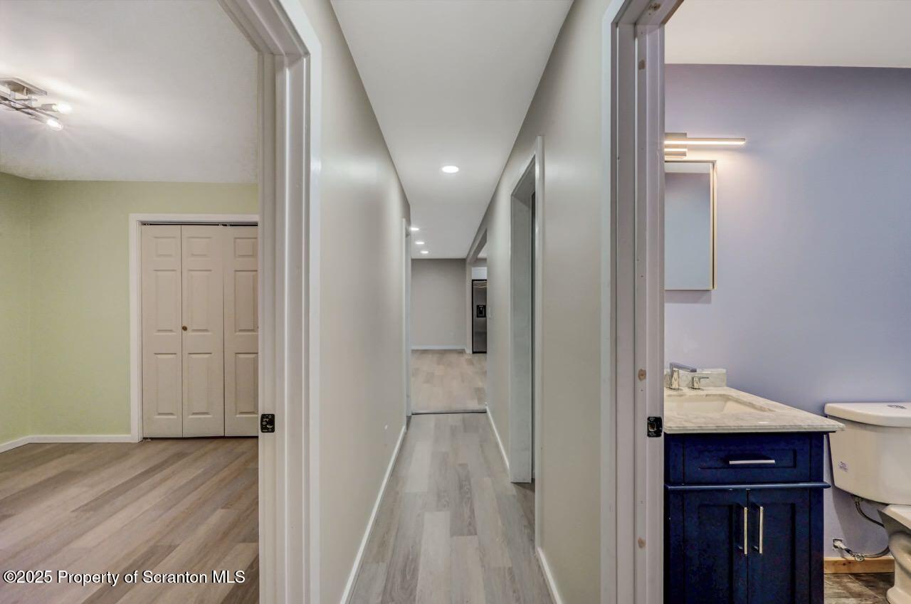 71 Sandy Beach Road Gouldsboro, PA 18424 - Photo 40 of 57 a view of a hallway with wooden floor