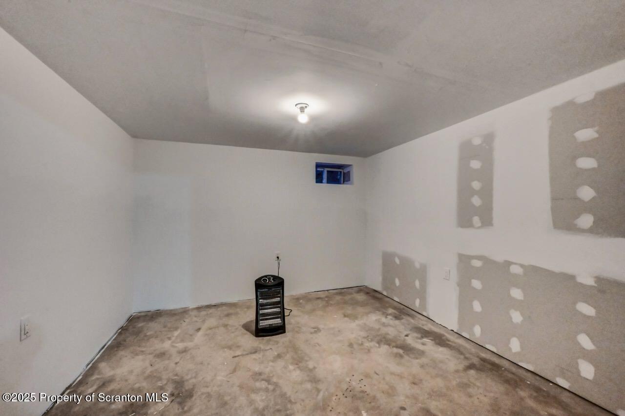 71 Sandy Beach Road Gouldsboro, PA 18424 - Photo 50 of 57 a view of a refrigerator and window