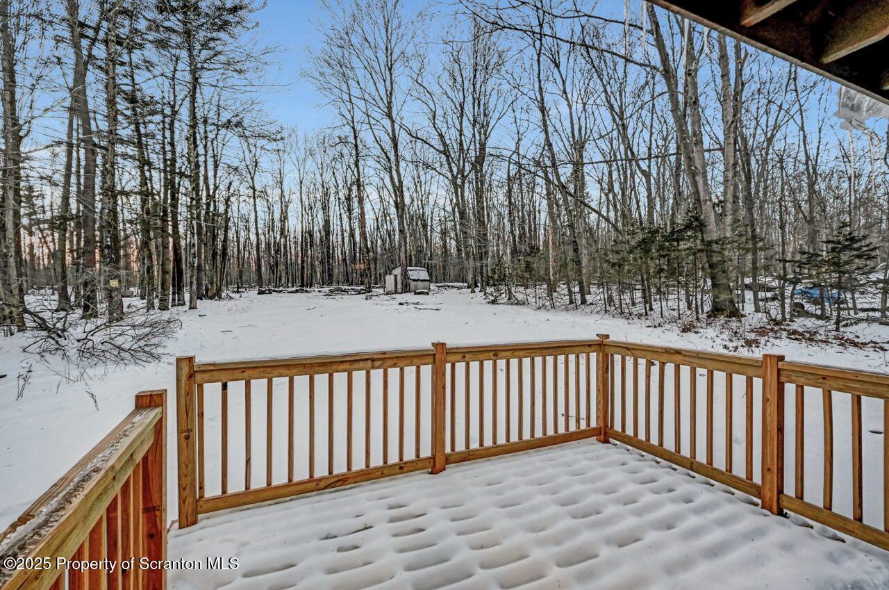 71 Sandy Beach Road Gouldsboro, PA 18424 - Photo 51 of 57 a view of a street with a trees