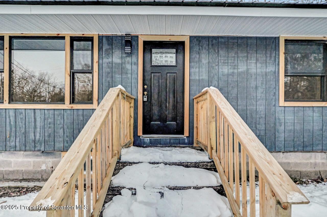 71 Sandy Beach Road Gouldsboro, PA 18424 - Photo 6 of 57 a view of staircase with railing and windows