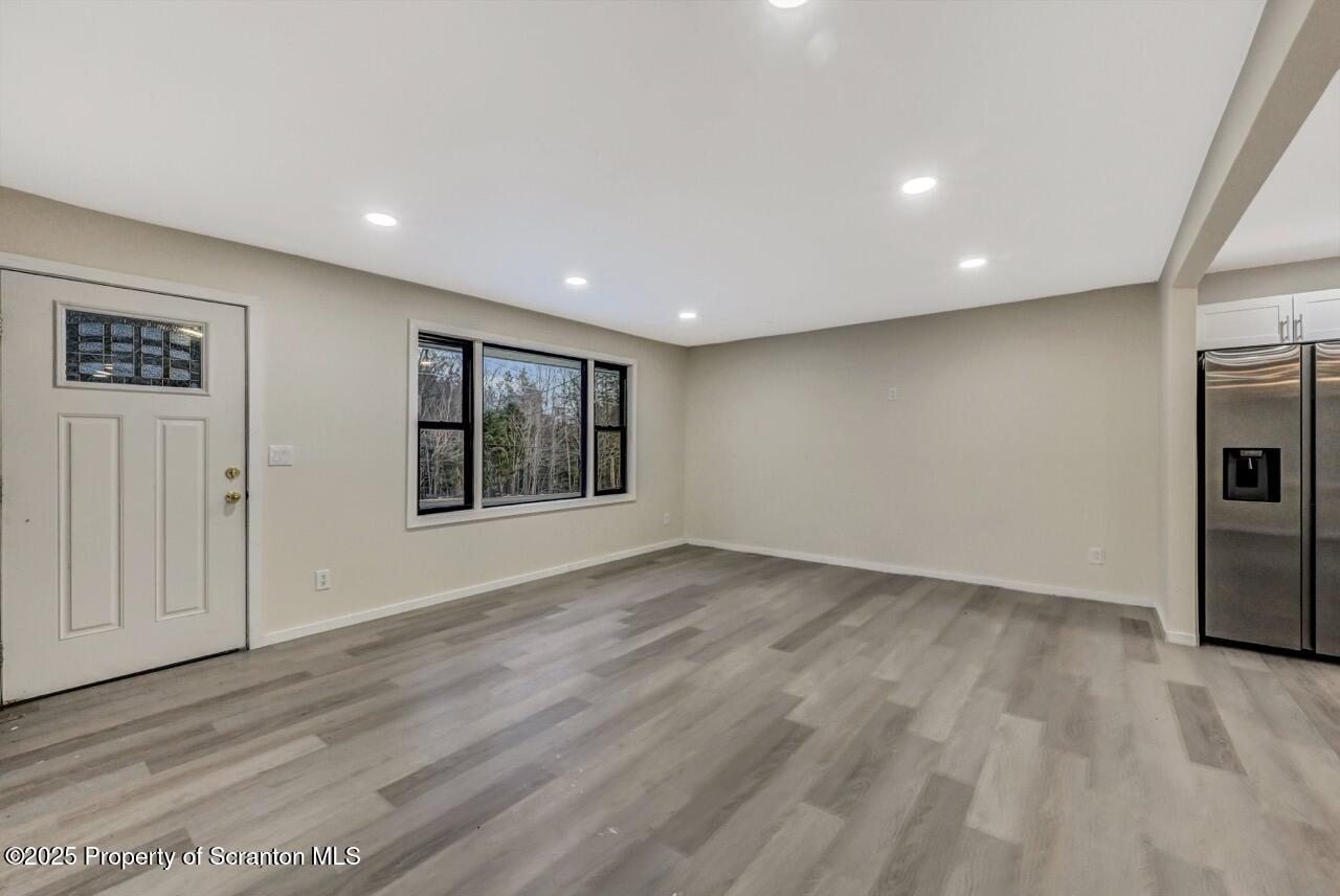 71 Sandy Beach Road Gouldsboro, PA 18424 - Photo 7 of 57 a view of an empty room with a window