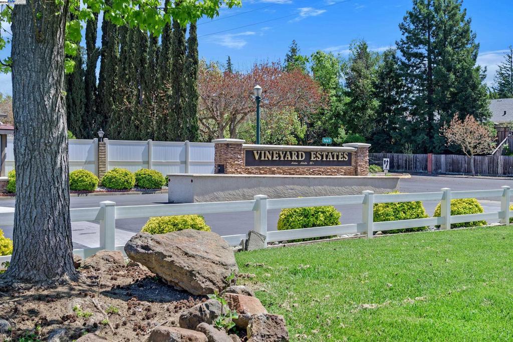 3263 Vineyard Avenue Pleasanton, CA 94566 - Photo 12 of 14 a view of a swimming pool with a patio