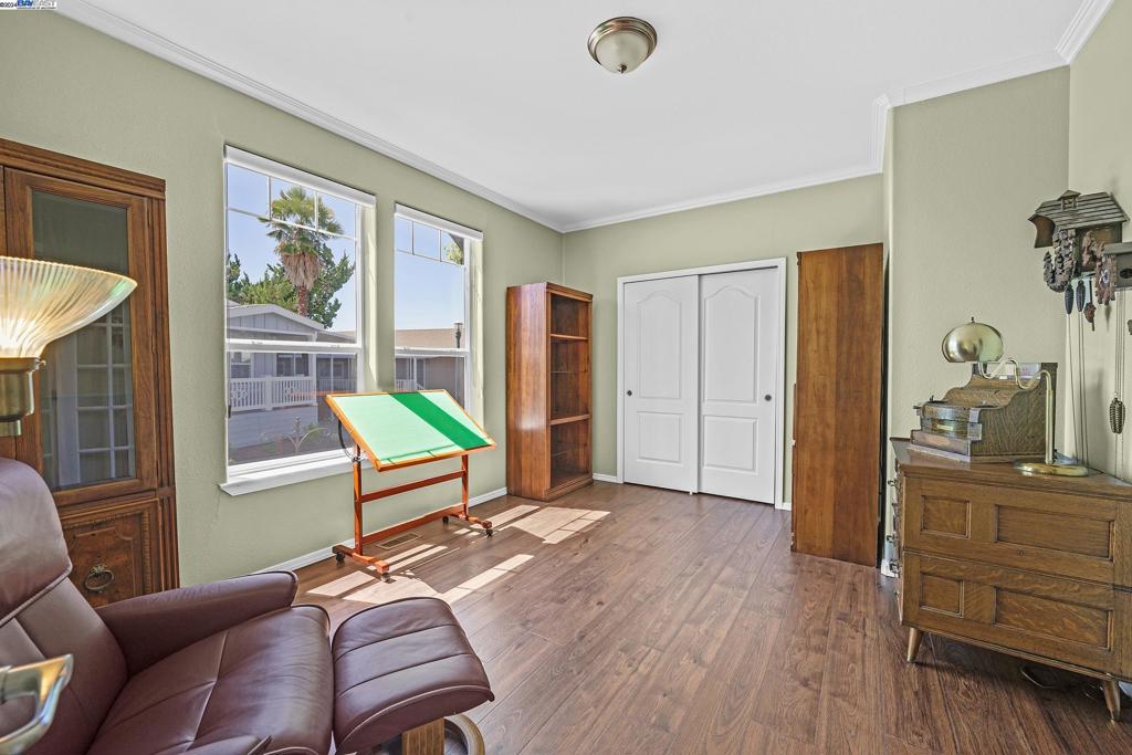3263 Vineyard Avenue Pleasanton, CA 94566 - Photo 7 of 14 a living room with furniture and a window