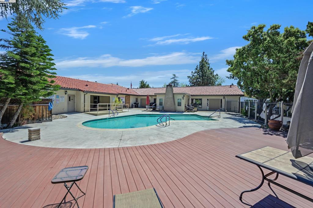 3263 Vineyard Avenue Pleasanton, CA 94566 - Photo 9 of 14 a view of house with yard entertaining space and seating area