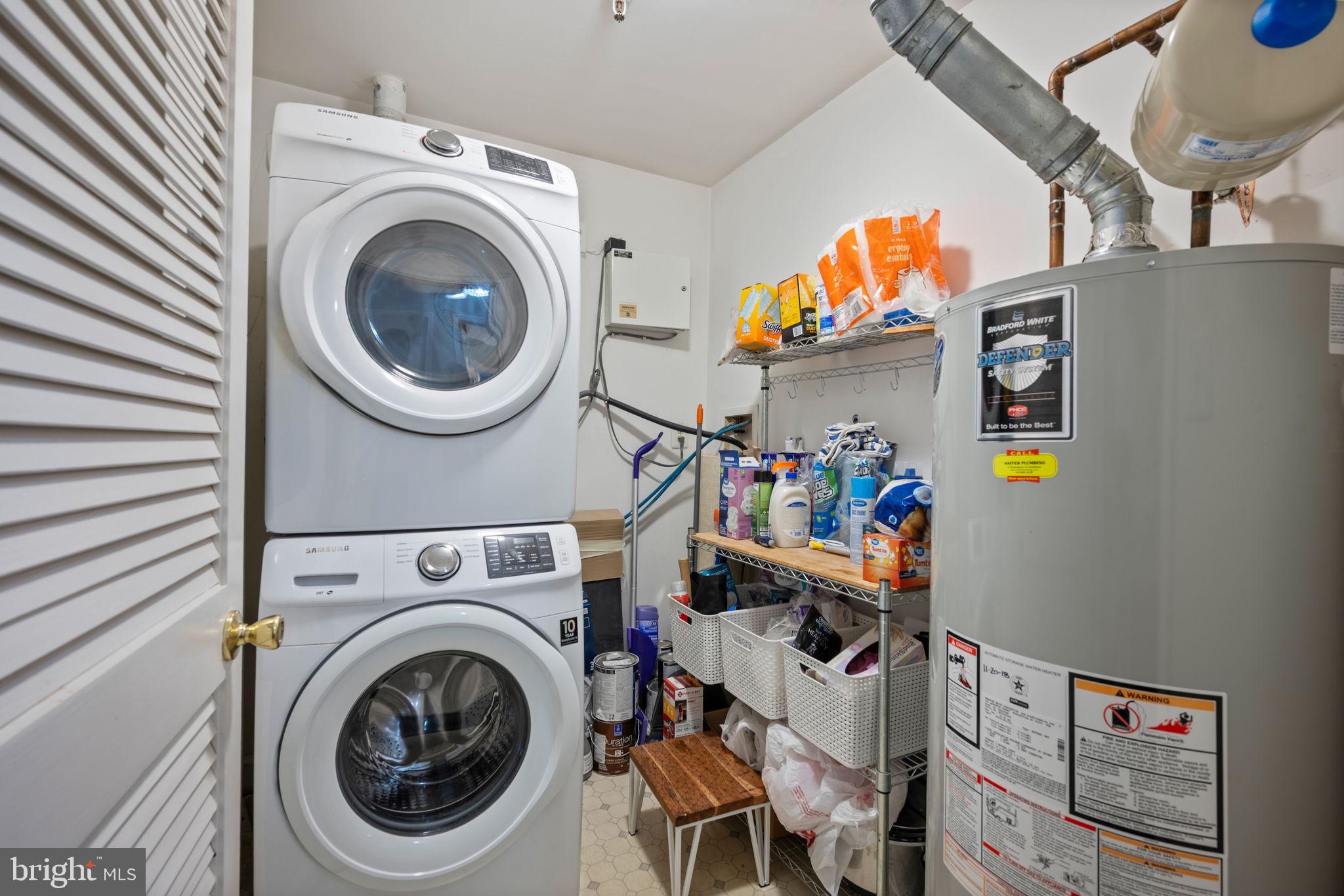 2322 Falls Gable Lane, Unit N Baltimore, MD 21209 - Photo 30 of 44 a utility room with dryer and washer