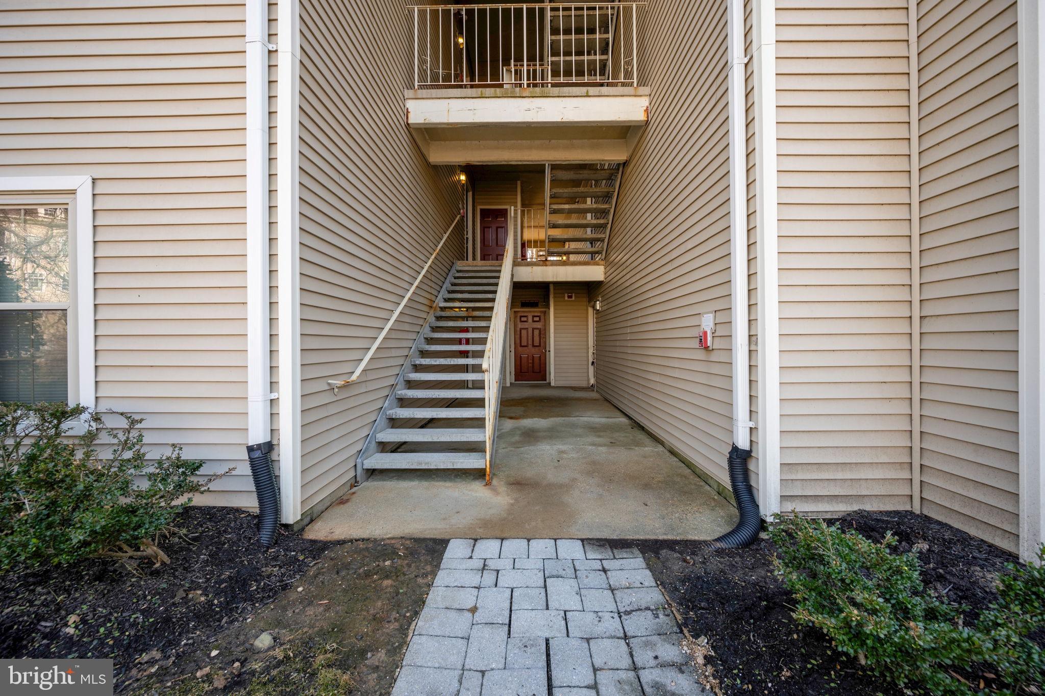 2322 Falls Gable Lane, Unit N Baltimore, MD 21209 - Photo 32 of 44 a view of a entryway with a white door