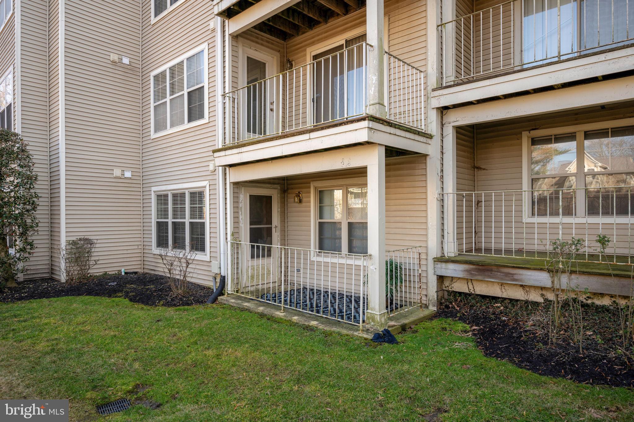 2322 Falls Gable Lane, Unit N Baltimore, MD 21209 - Photo 33 of 44 a view of a house with a yard and sitting area