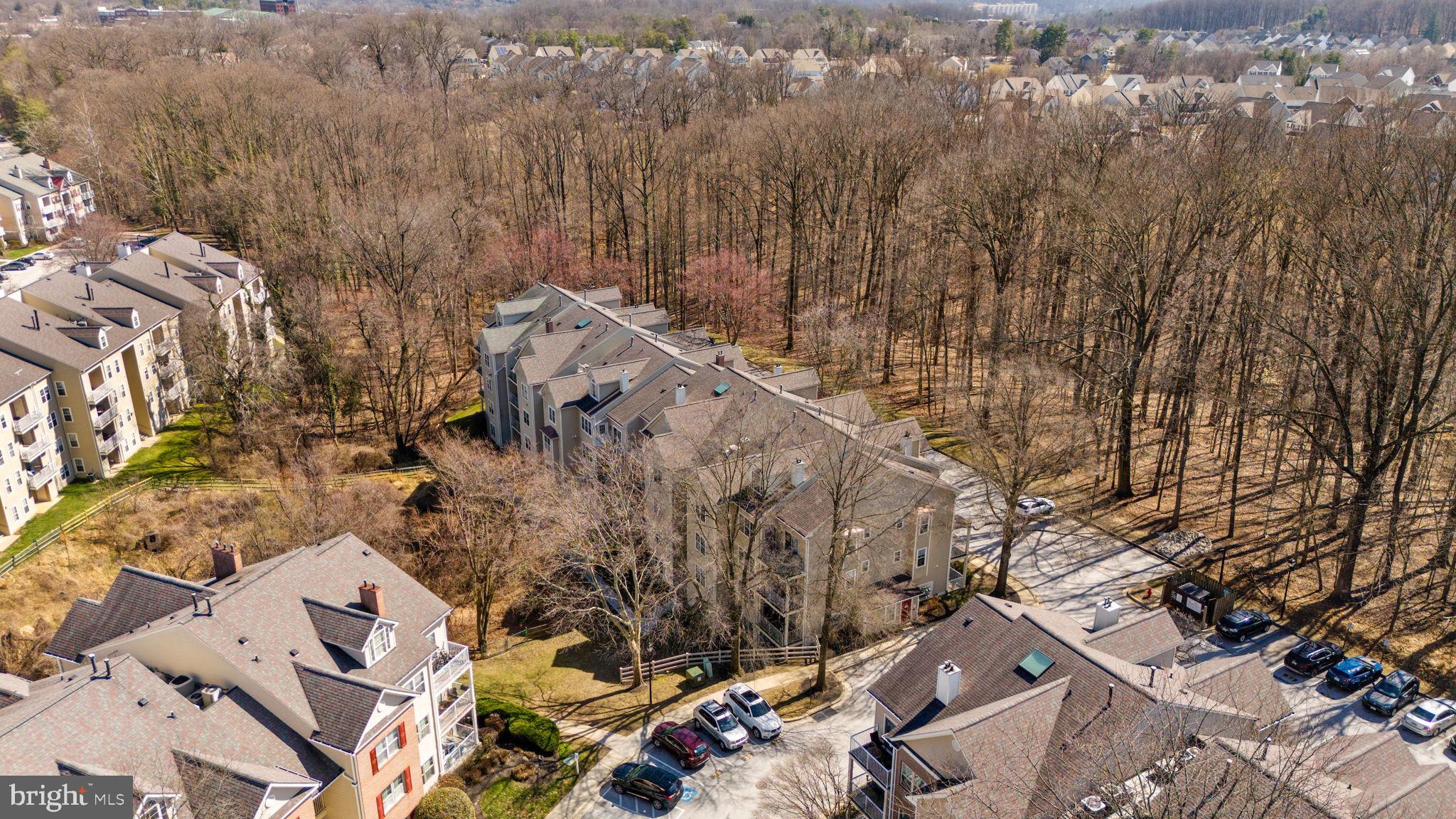 2322 Falls Gable Lane, Unit N Baltimore, MD 21209 - Photo 35 of 44 an aerial view of residential house with parking