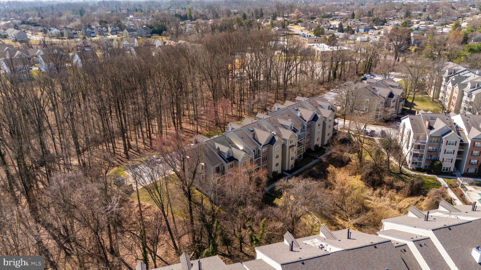 2322 Falls Gable Lane, Unit N Baltimore, MD 21209 - Photo 42 of 44 a view of residential houses with outdoor space