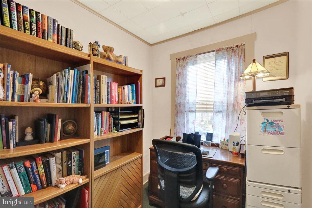 375 Sunset Road Reading, PA 19611 - Photo 13 of 23 a living room with lots of books and furniture