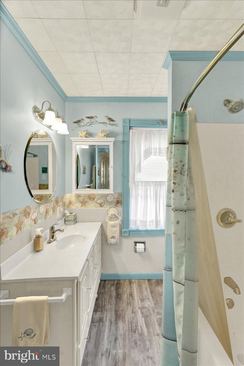375 Sunset Road Reading, PA 19611 - Photo 15 of 23 a spacious bathroom with a sink mirror and vanity