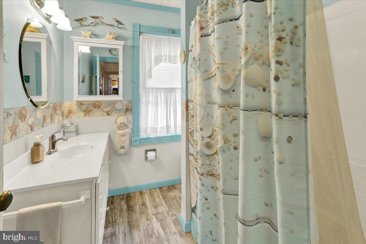 375 Sunset Road Reading, PA 19611 - Photo 16 of 23 a bathroom with a sink vanity and a mirror