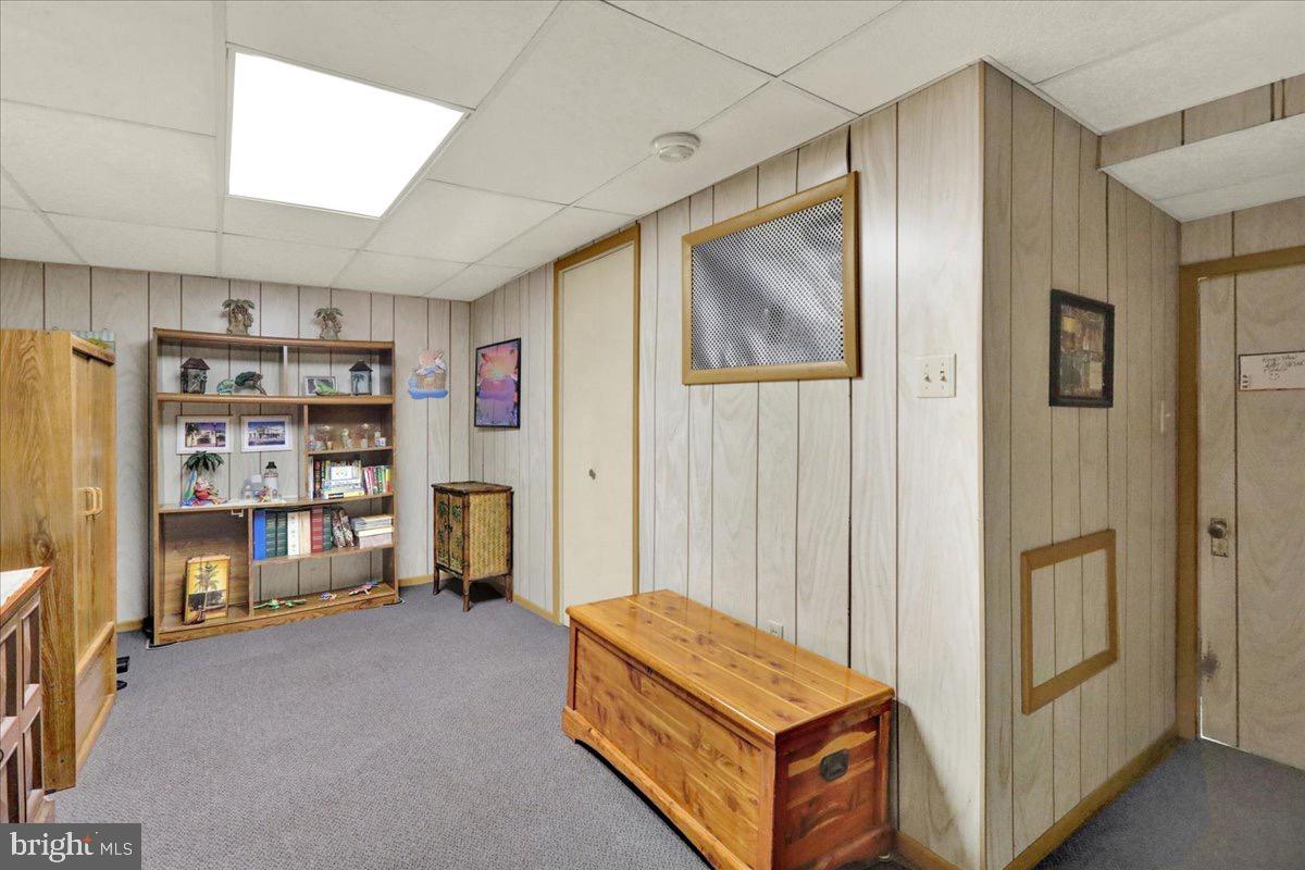 375 Sunset Road Reading, PA 19611 - Photo 17 of 23 a room with storage and a flat screen tv