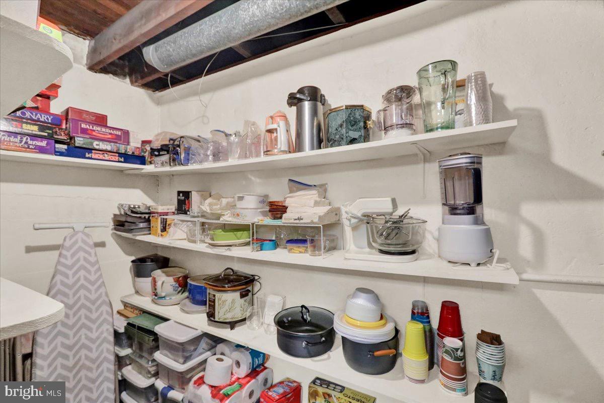 375 Sunset Road Reading, PA 19611 - Photo 19 of 23 a cabinet with granite countertop lots of different kinds of food