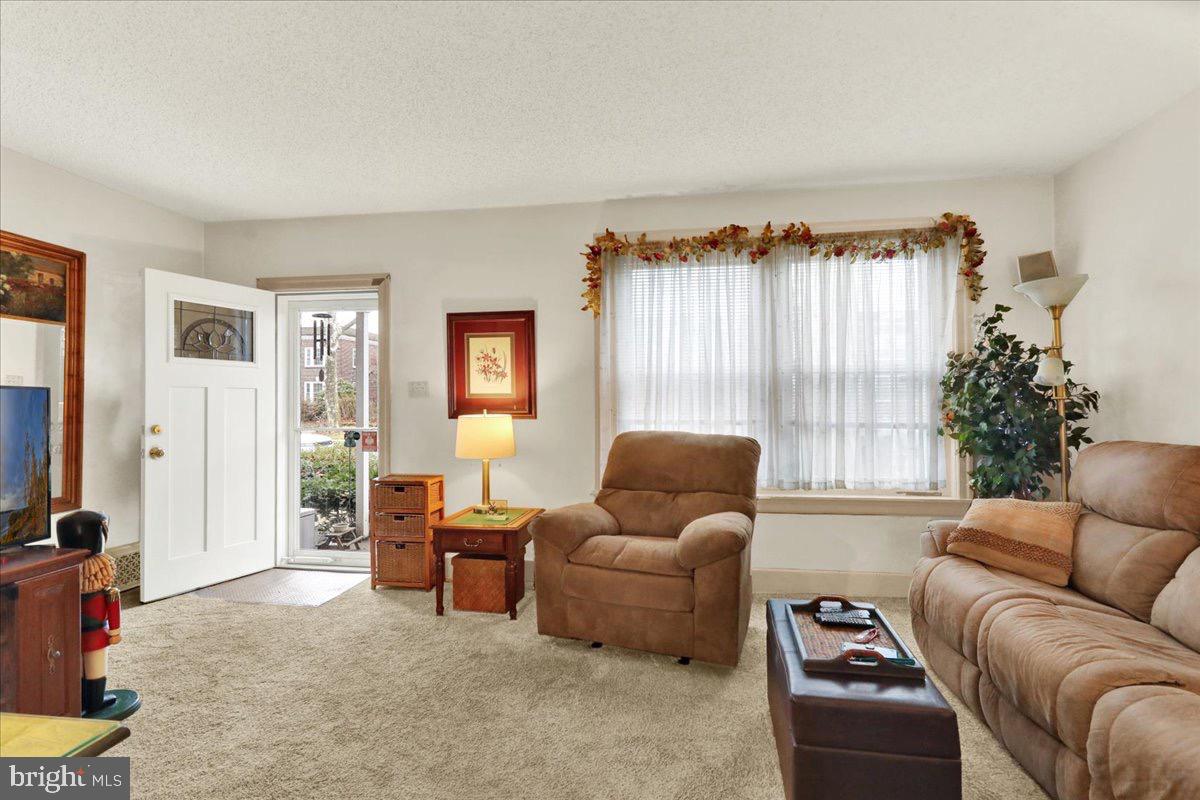 375 Sunset Road Reading, PA 19611 - Photo 2 of 23 a living room with furniture and a large window