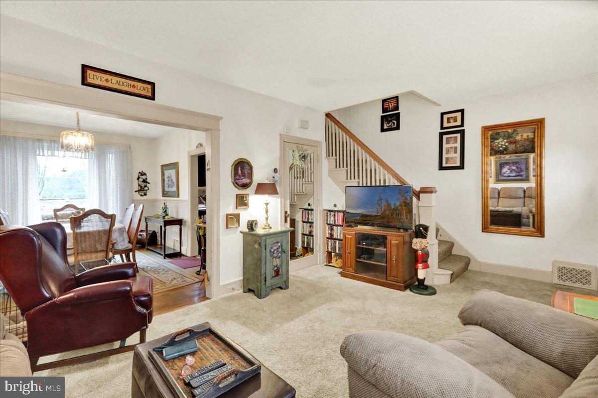 375 Sunset Road Reading, PA 19611 - Photo 3 of 23 a living room with furniture and a flat screen tv