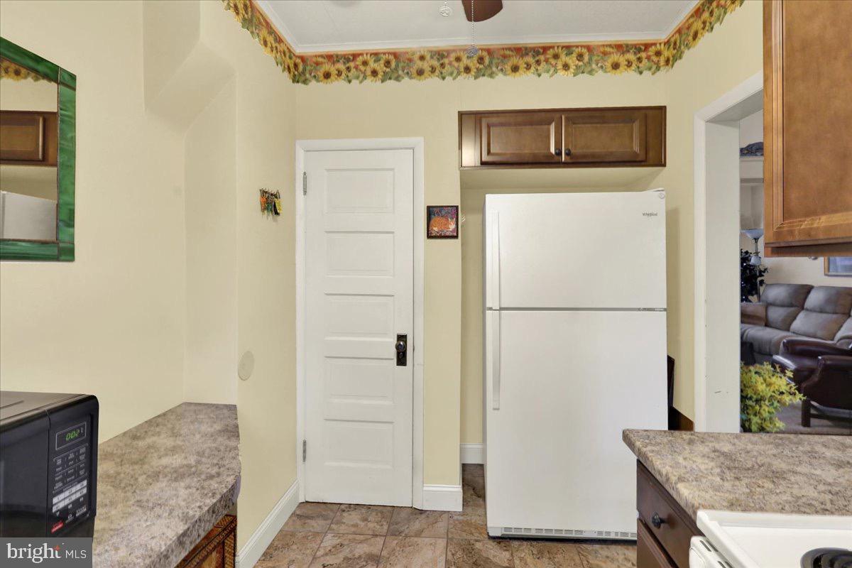 375 Sunset Road Reading, PA 19611 - Photo 7 of 23 a hallway with washer and dryer