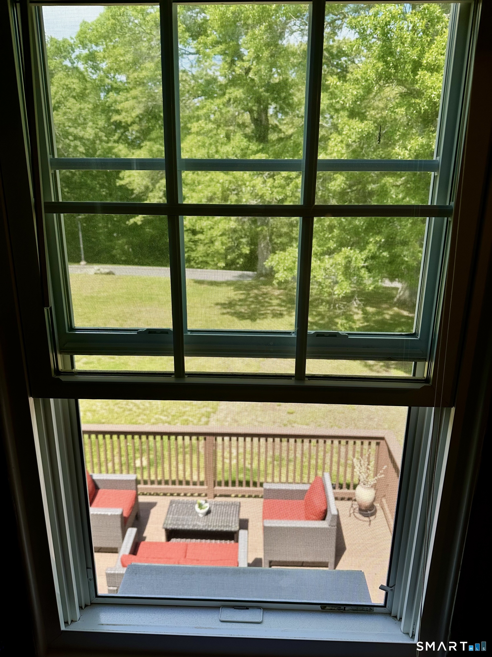 2 Lakeside Drive, Unit M Ledyard, CT 06339 - Photo 20 of 38 a view of a glass door with a bench