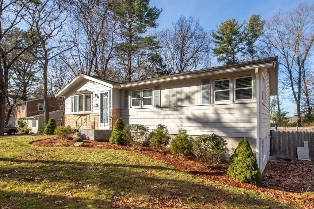 1 Spring Lane Sharon, MA 02067 - Photo 21 of 23 a front view of a house with a yard